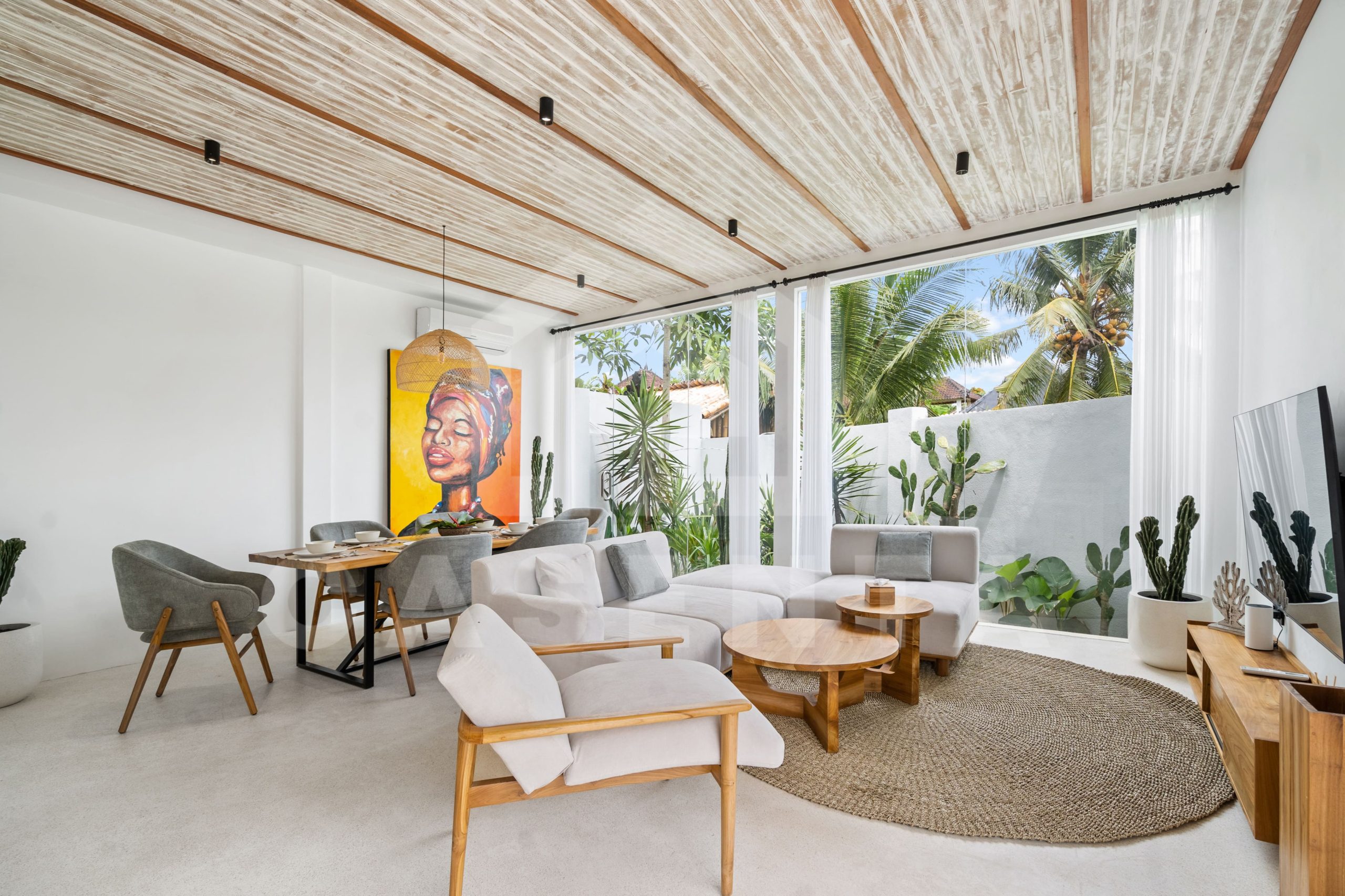 open living room with garden view in Sayan villa