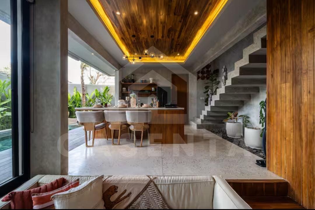 dining and living area in modern Bukit villa