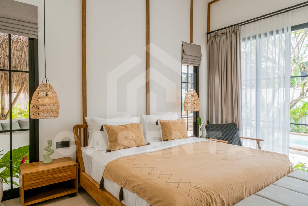 Elegant bedroom with garden views in Ubud villa