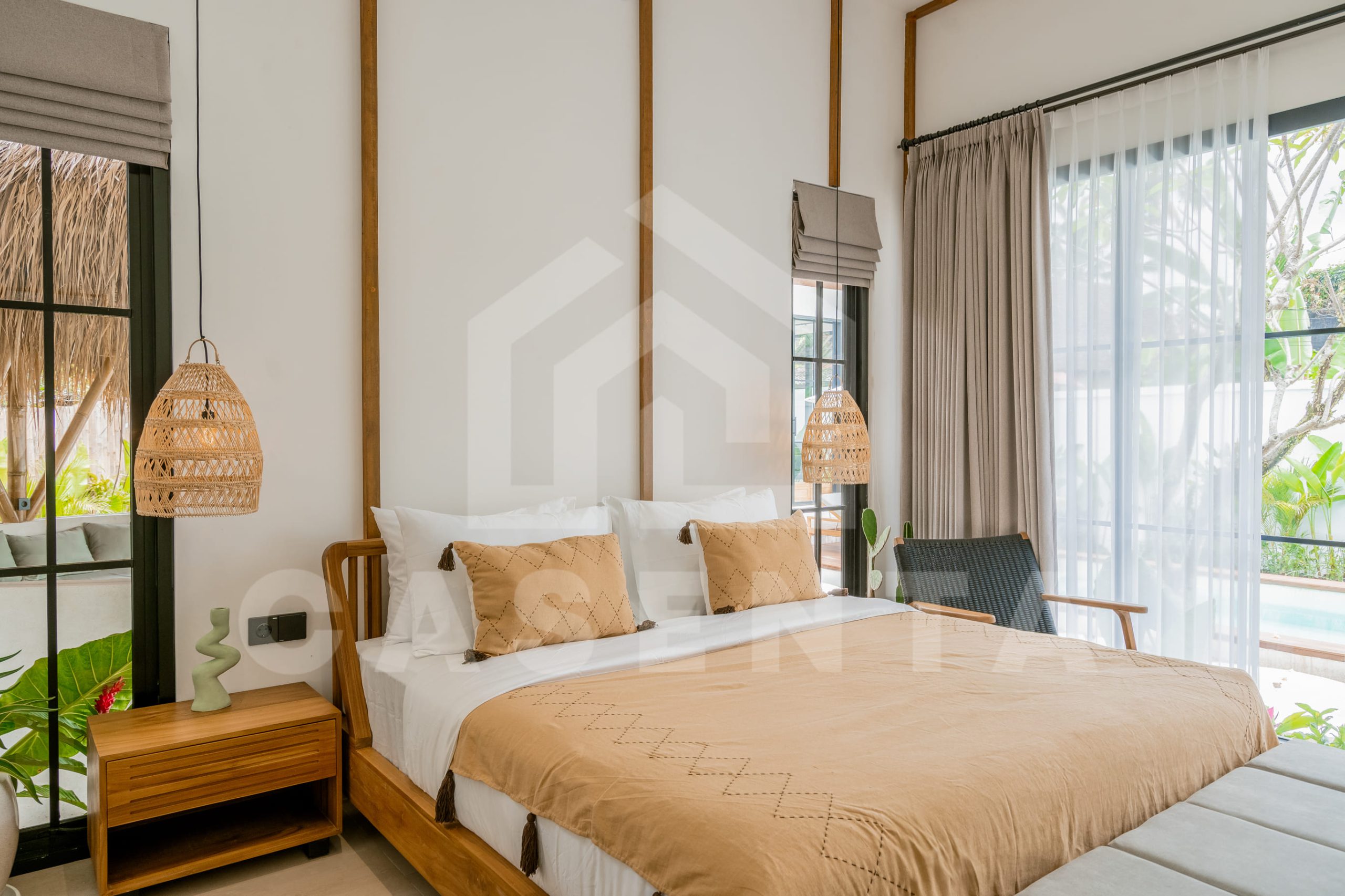 Elegant bedroom with garden views in Ubud villa