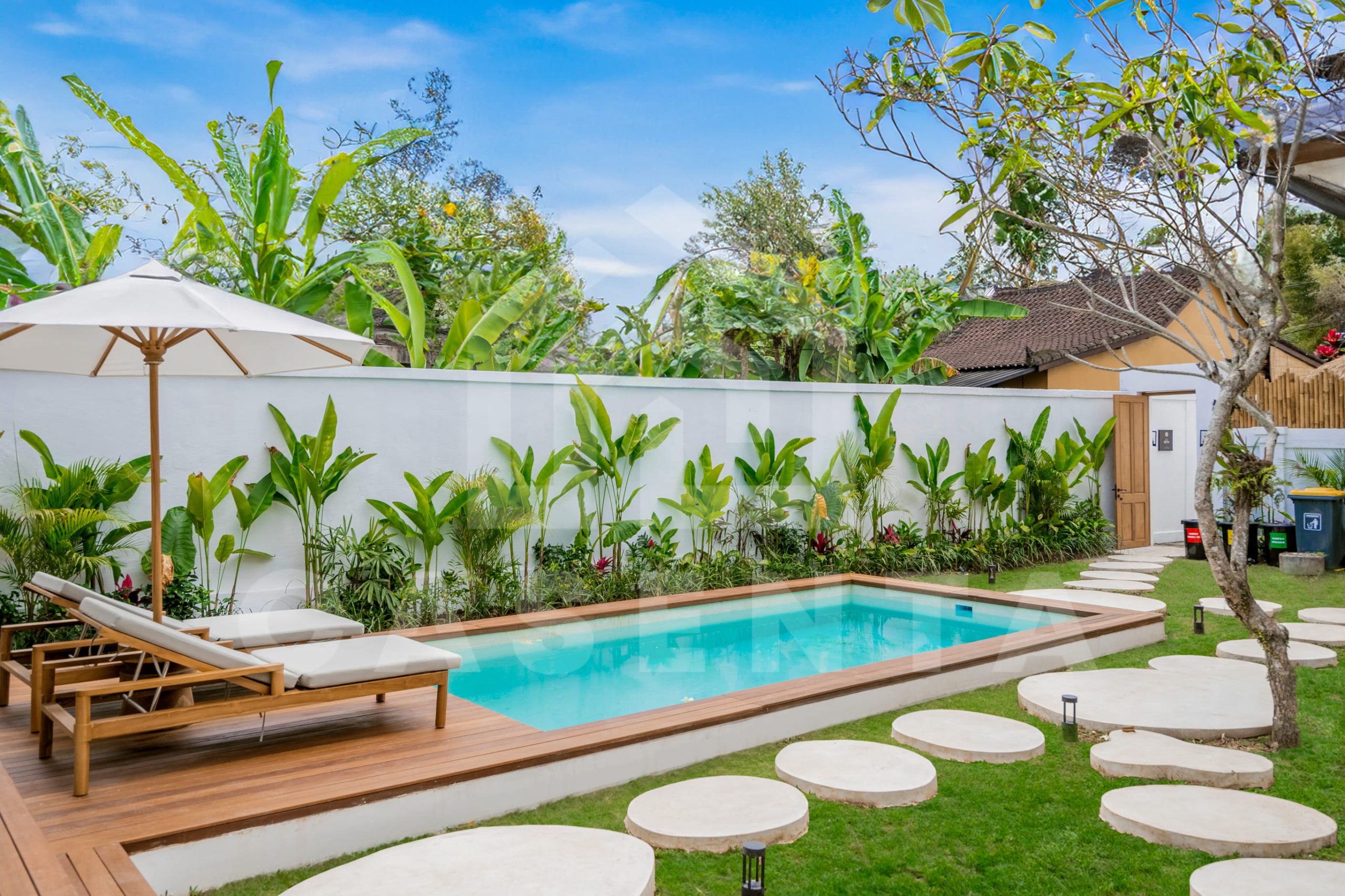 Tropical garden and pool area in spacious Ubud villa