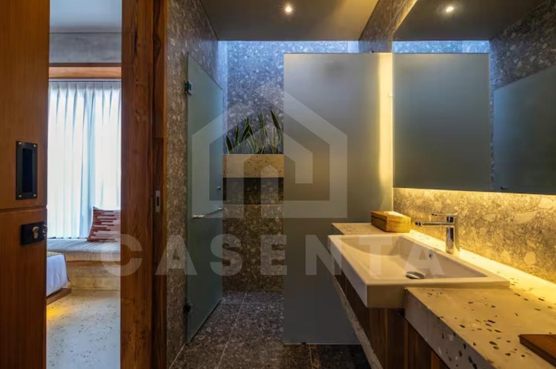 outdoor shower in Bukit villa tropical setting